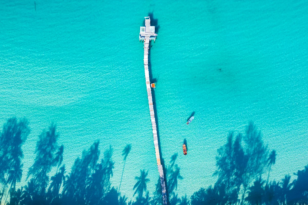 Wooden pier at Bang Bao Beach on Koh Kood island in Thailand