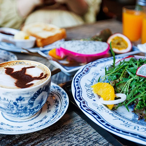 Coffee and colorful healthy dishes