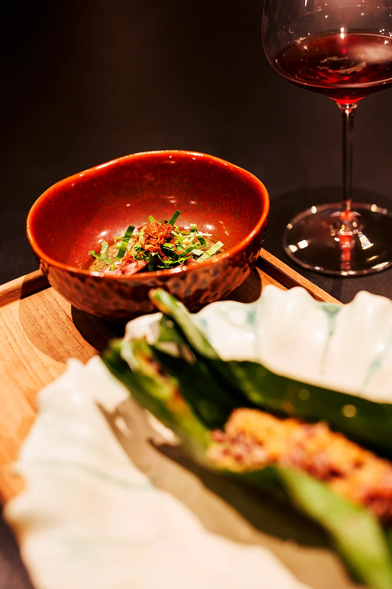 Gourmet dish with wine pairing at Choen restaurant in Bangkok