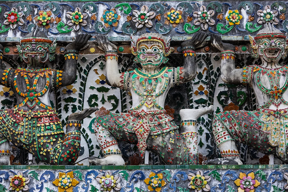 Wat Arun temple in Bangkok decorated with colorful porcelain pieces