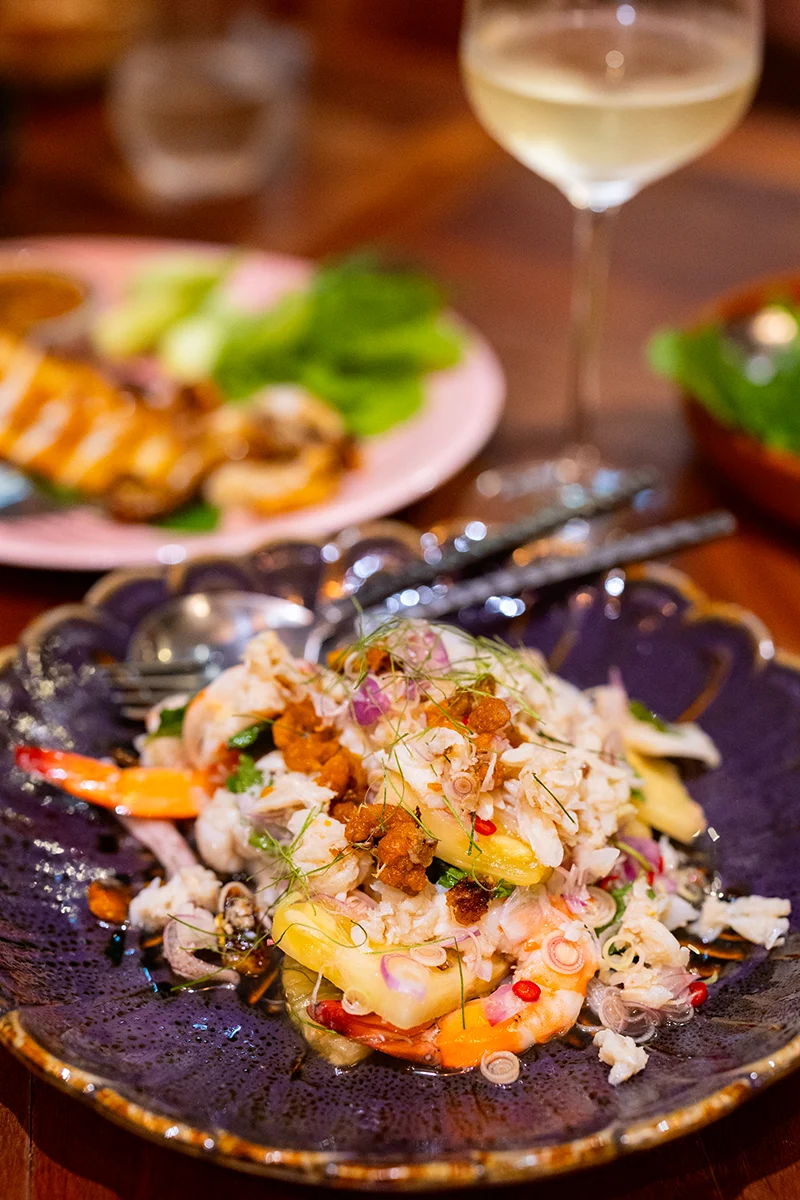Colorful Thai seafood salad with herbs
