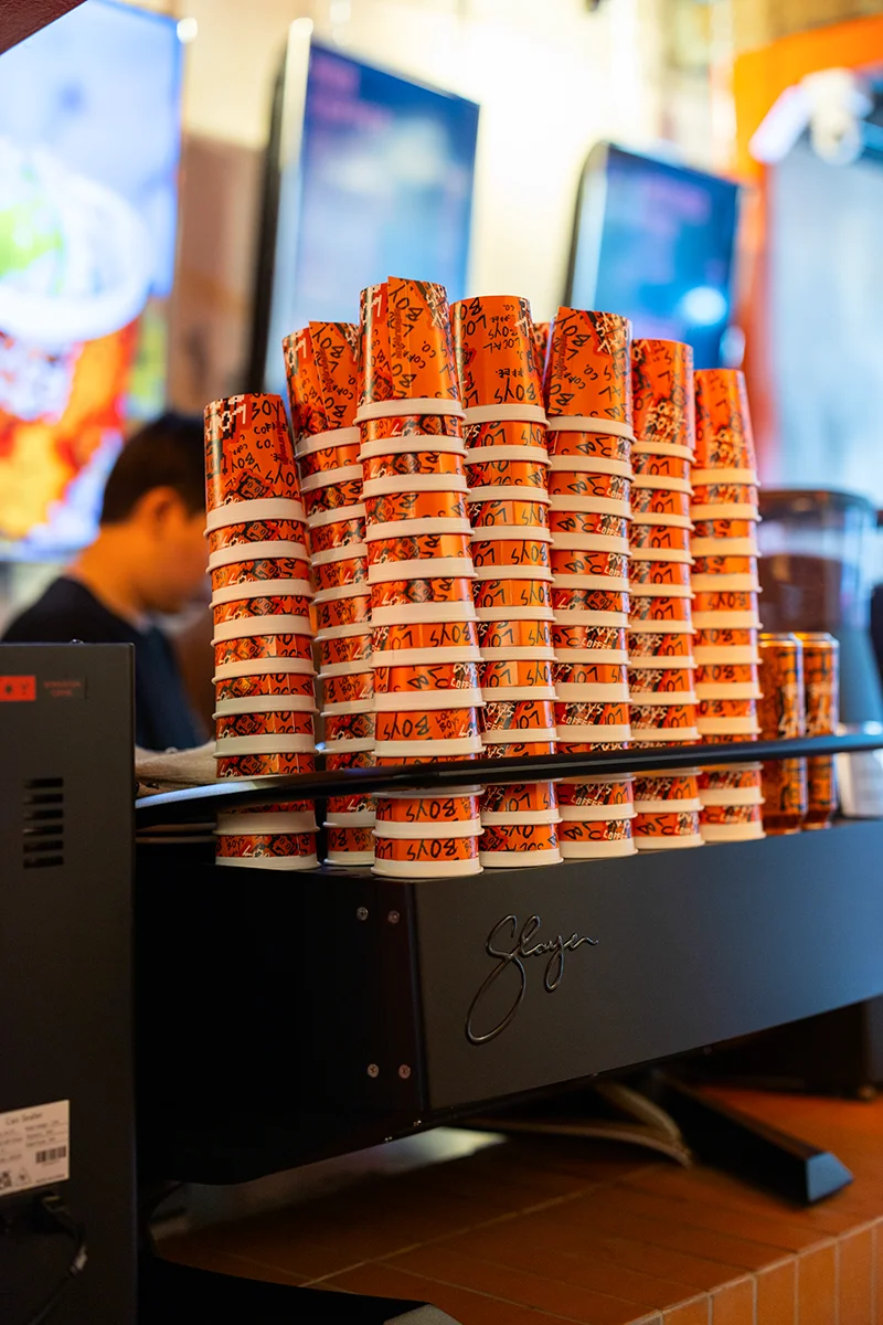 Stacked coffee cups on display at Local Boys Coffee Co.