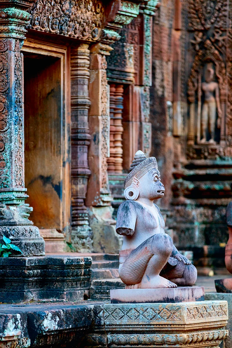 Remarkably preserved detailed carvings in pink sandstone at Banteay Srei temple in Angkor