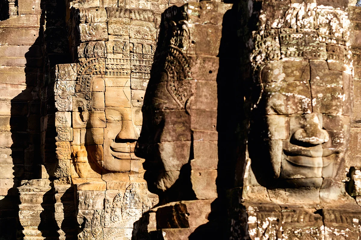 Bayon temple iconic smiling stone faces in Angkor complex in Cambodia