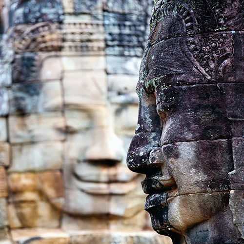 Bayon temple iconic smiling stone faces in Angkor complex in Cambodia