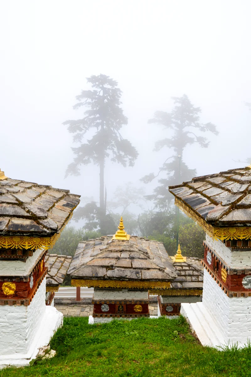 Dochula Pass with traditional stupas is one of the stops on Bhutan Festival Itinerary