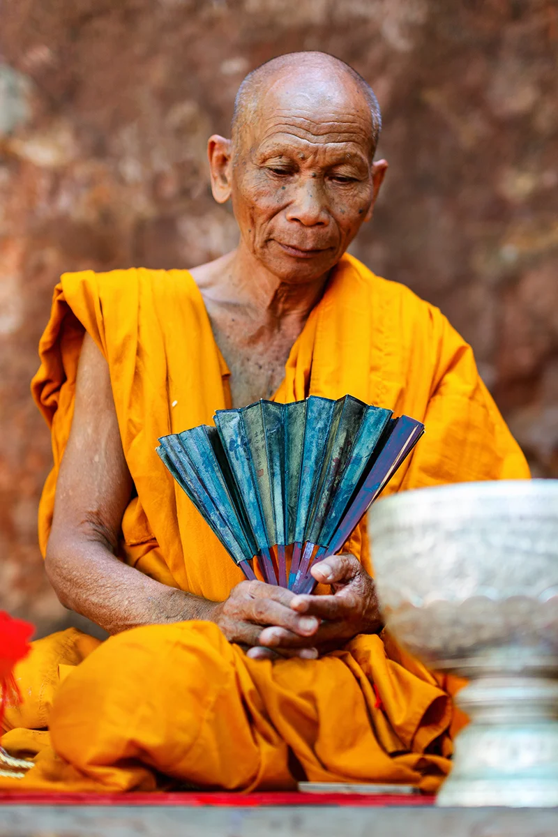 Cambodia itinerary Monk at sacred Phnom Kulen temple