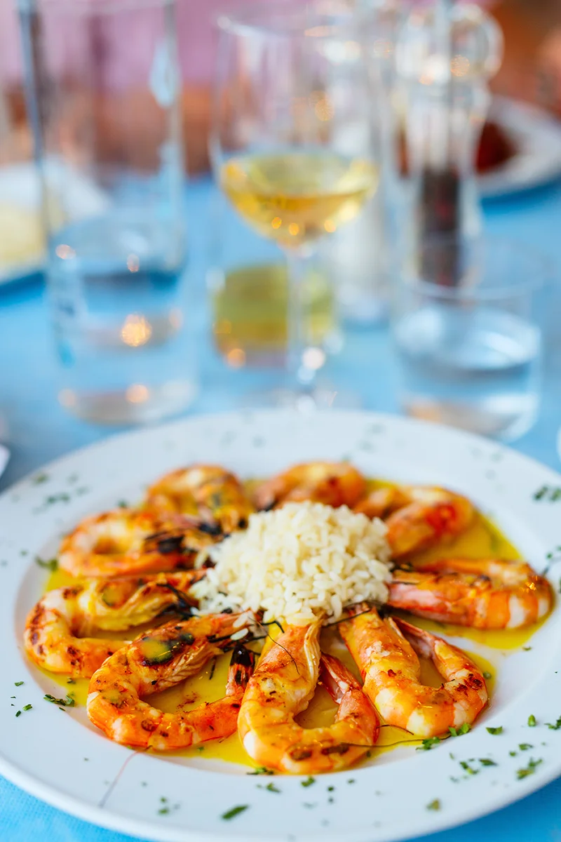 Shrimp saganaki traditional Greek dish served at Enalion restaurant