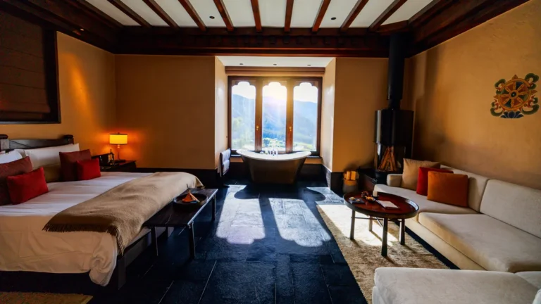 Luxurious room with scenic mountain view at Gangtey Lodge in Bhutan