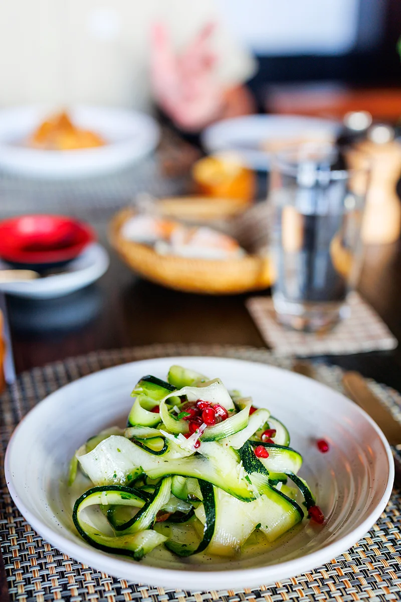 Fresh zucchini salad with pomegranate