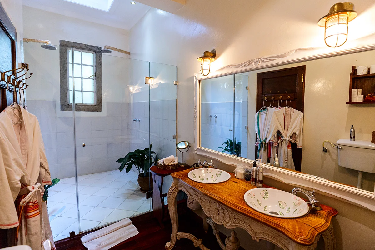 Elegant bathroom interior of the Finch Hatton Suite at Garden Manor hotel in Kenya