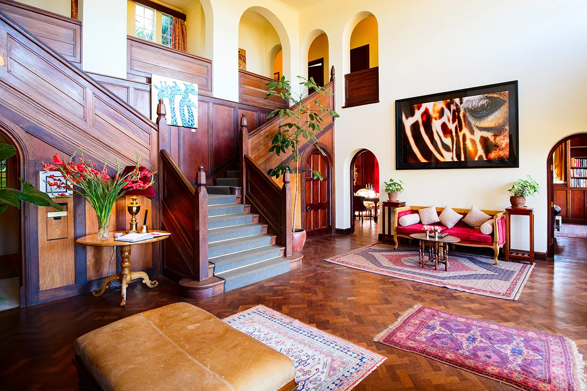 Interior of common area in historic Giraffe Manor hotel in Kenya