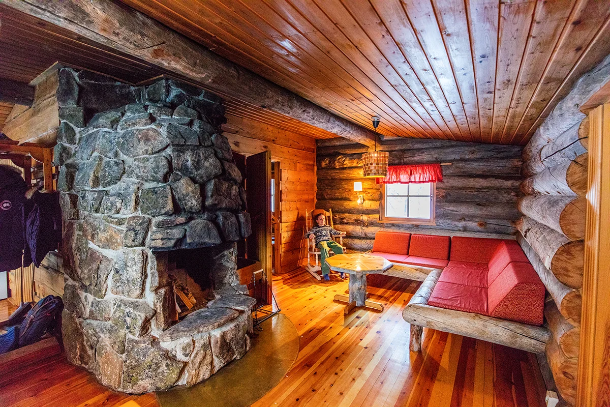 Cozy interior of log cabin in Kakslauttanen Arctic Resort in Finland