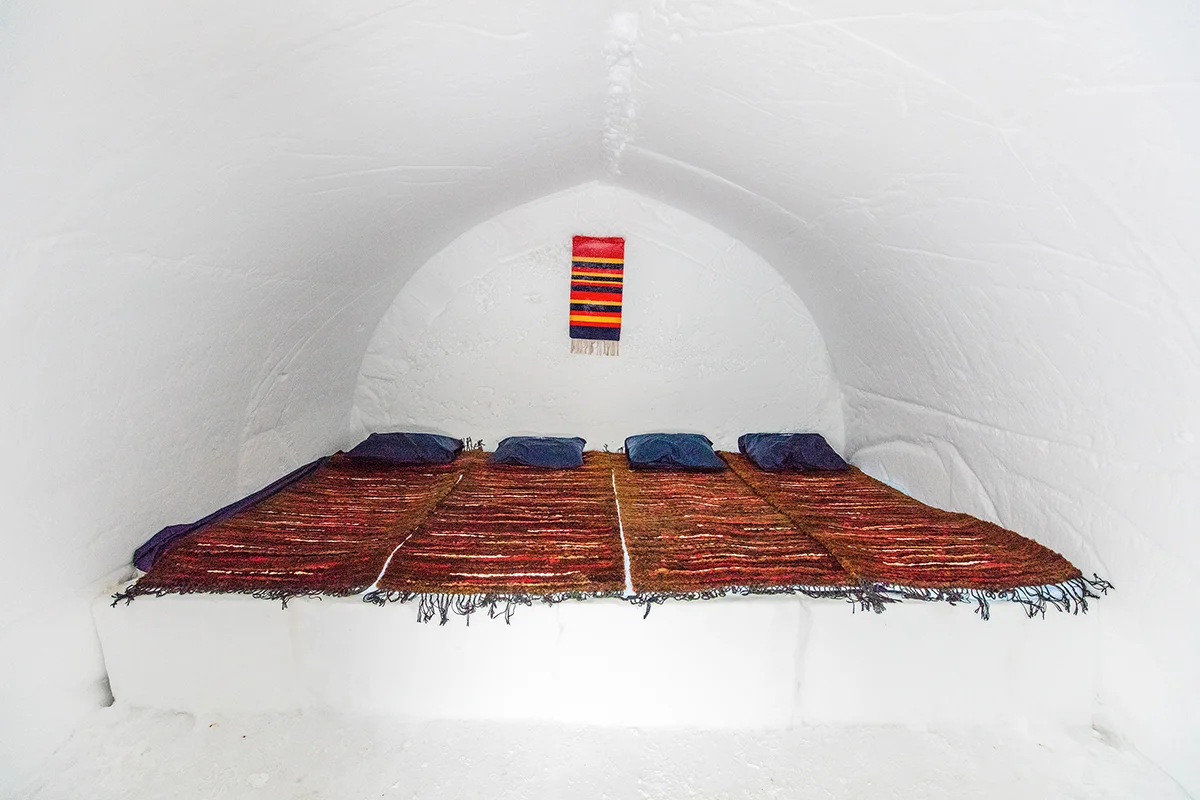 Interior of a snow igloo at Kakslauttanen Arctic Resort in Finland