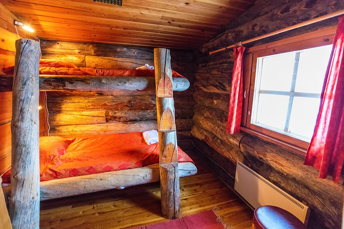 Cozy interior of log cabin in Kakslauttanen Arctic Resort in Finland