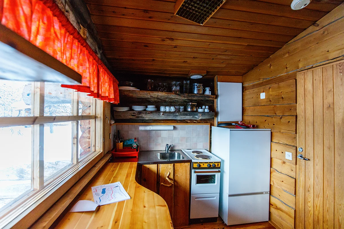 Cozy interior of log cabin in Kakslauttanen Arctic Resort in Finland