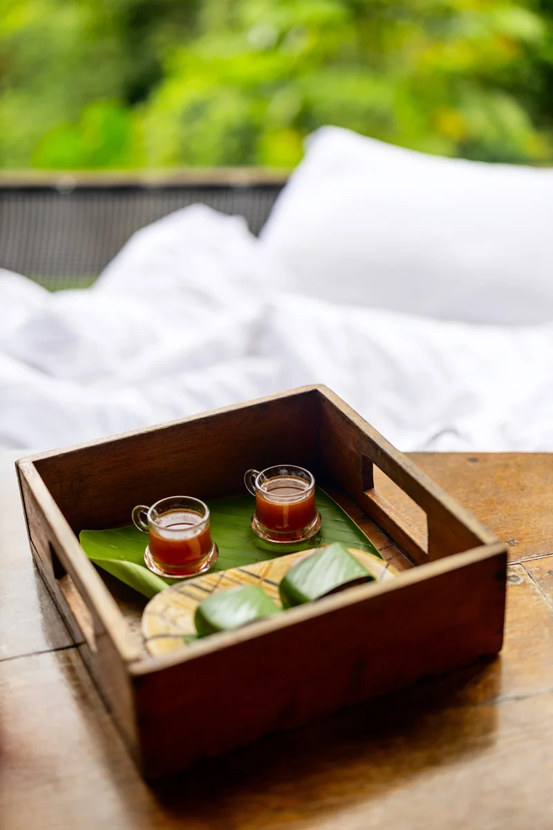 Cacao tea and muffins on wooden tray