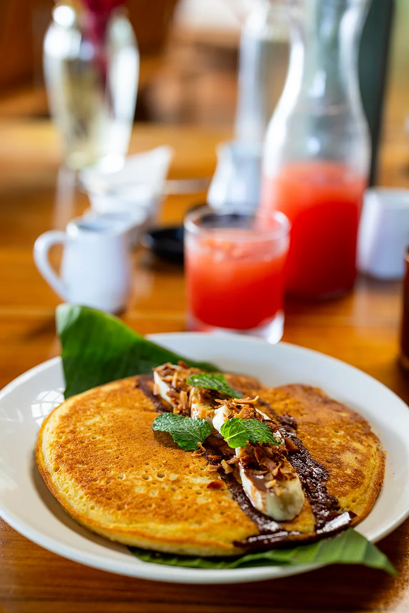 Delicious pancake with banana and chocolate