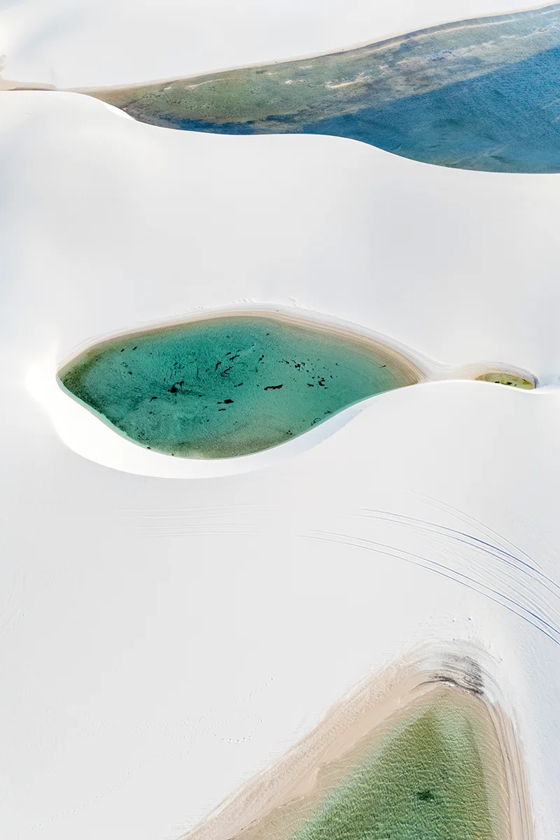 White sand dunes with turquoise lagoons in Lençóis Maranhenses Brazil