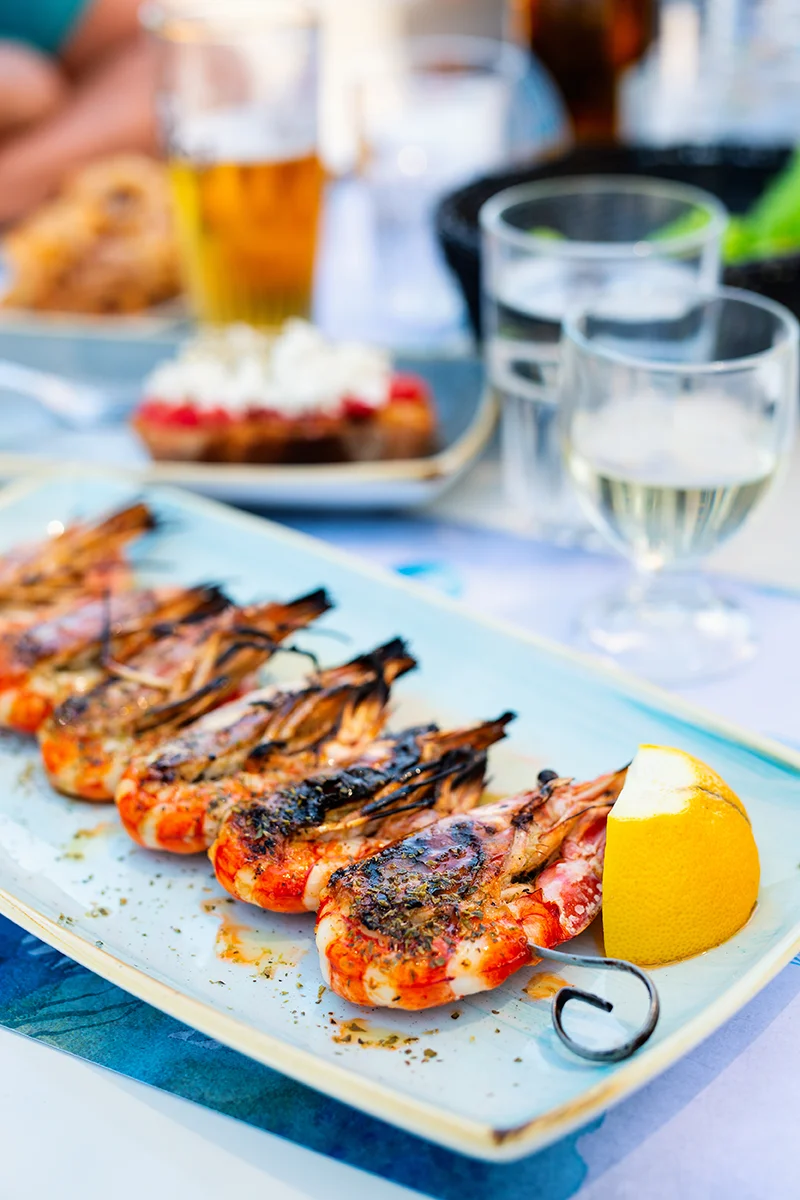 Shrimp souvlaki traditional Greek dish served at Medusa restaurant one of the best places to eat in Milos