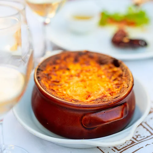 Moussaka traditional Greek dish served at Avli-Milos restaurant