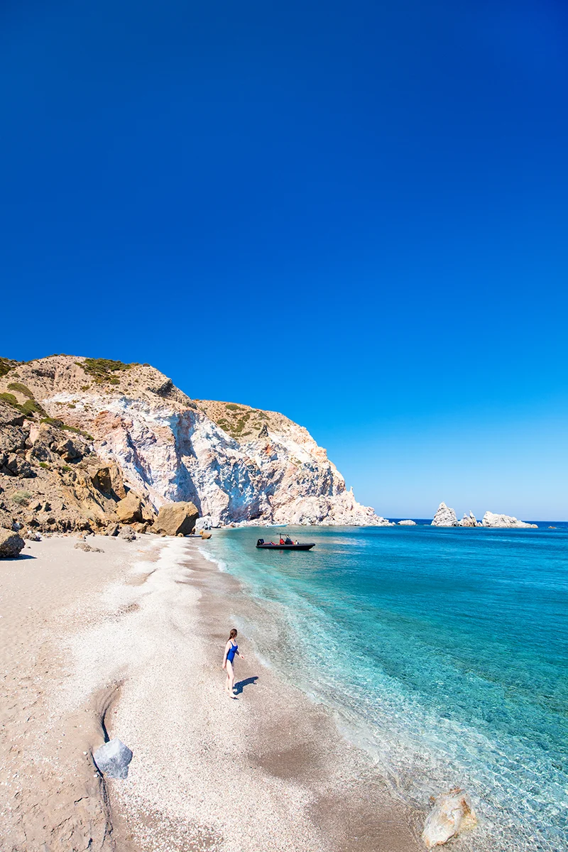 Tranquil beach in Milos accessible only by boat