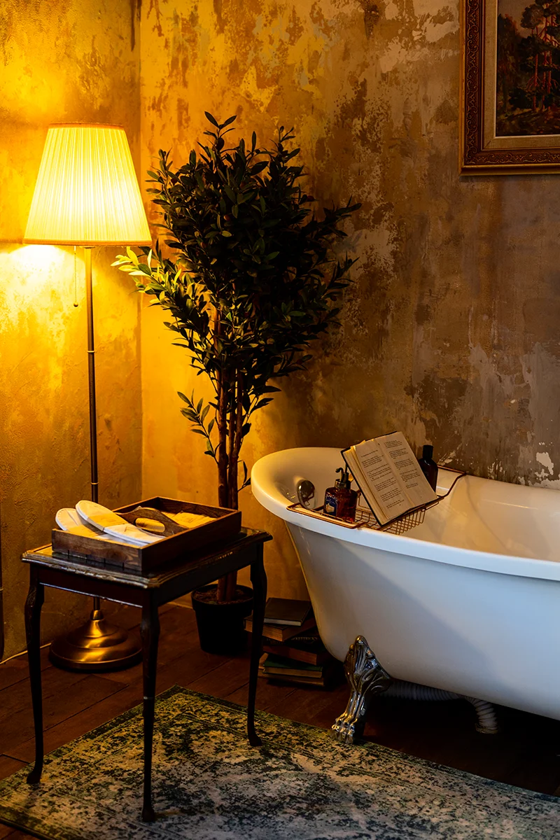 Cozy bathroom with vintage decor in The Mustang Blu boutique hotel in Bangkok Thailand