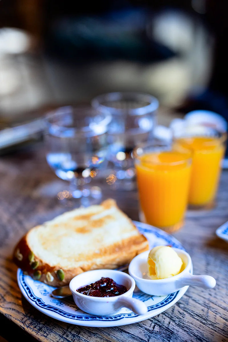 Breakfast with toast, jam, and juice