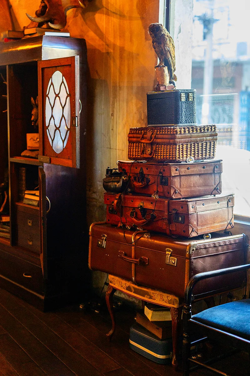 Stack of vintage suitcases and decor