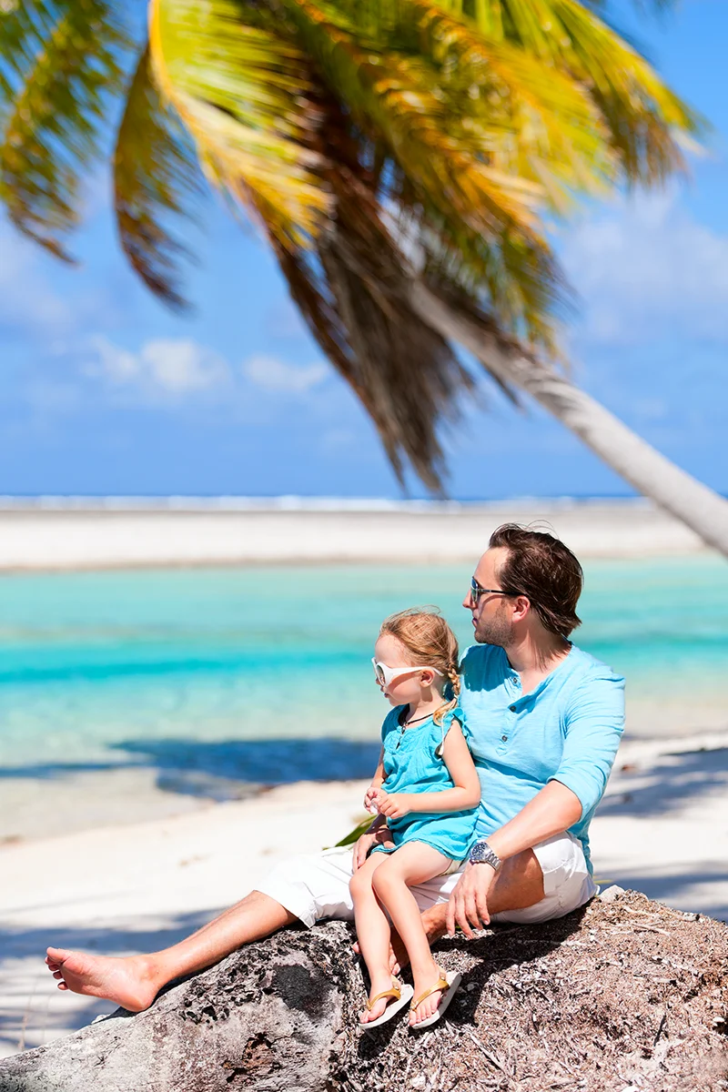 Father and daughter at Ninamu resort beach