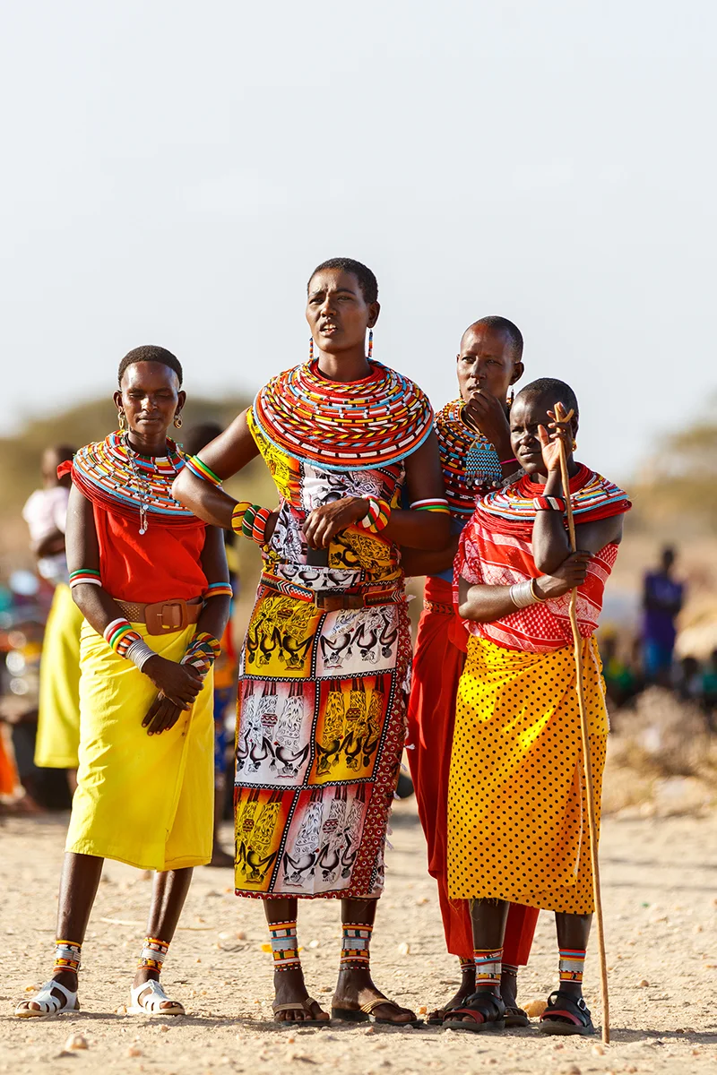 Samburu women wearing traditional colorful clothes during a cultural experience in Kenya