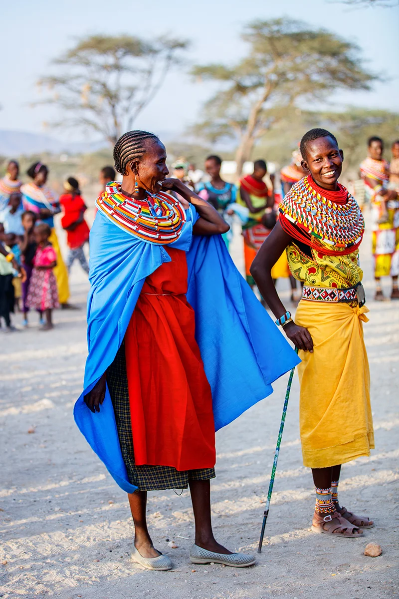 Samburu women wearing traditional colorful clothes during a cultural experience in Kenya