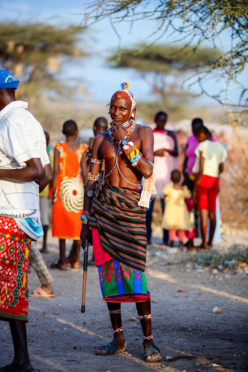 Samburu man wearing traditional colorful clothes during a cultural experience in Kenya