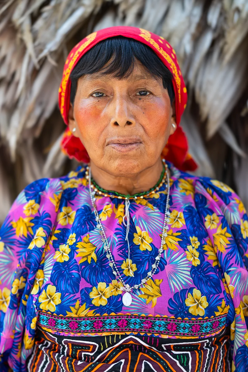 Guna woman in traditional dress decorated with molas