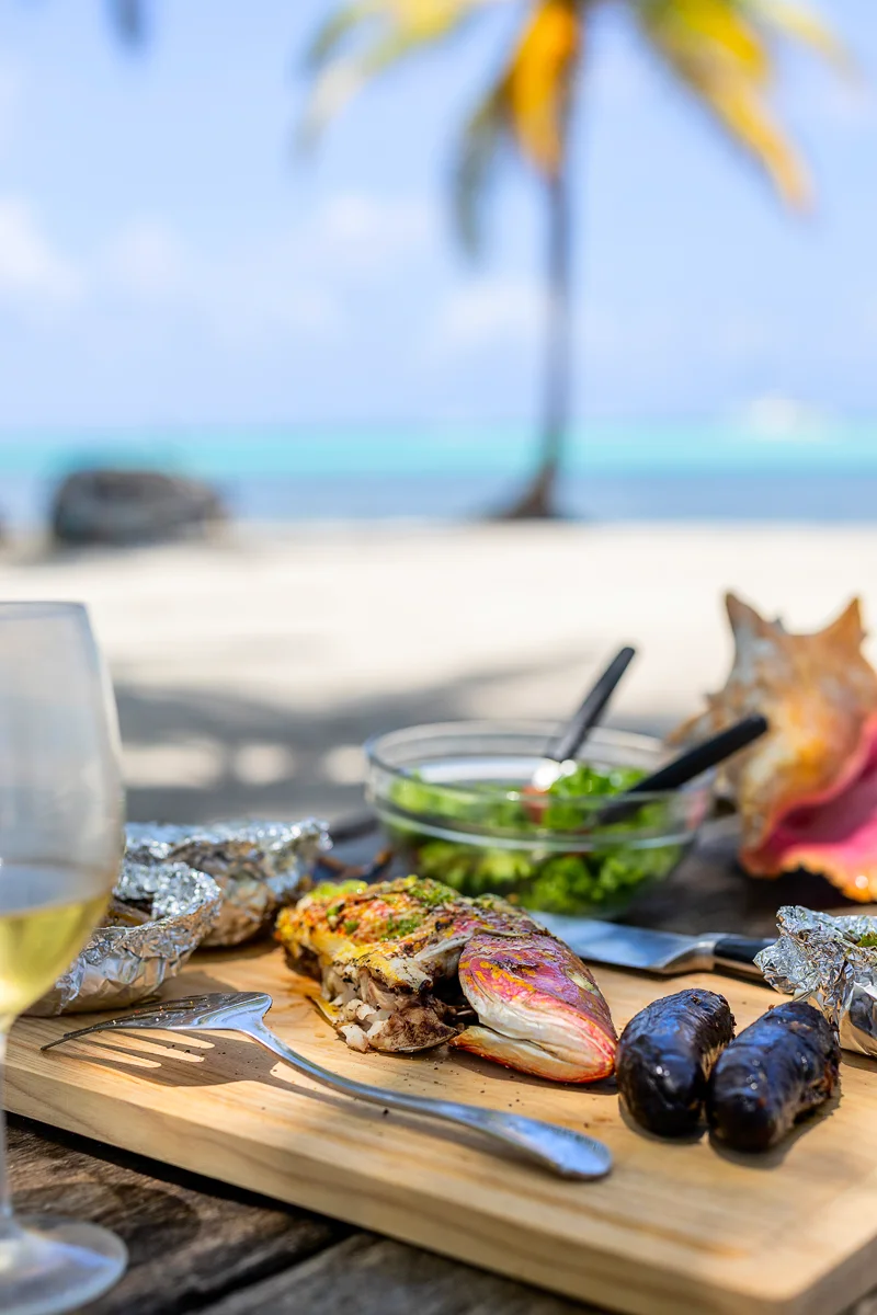 Seafood BBQ meal on tropical beach