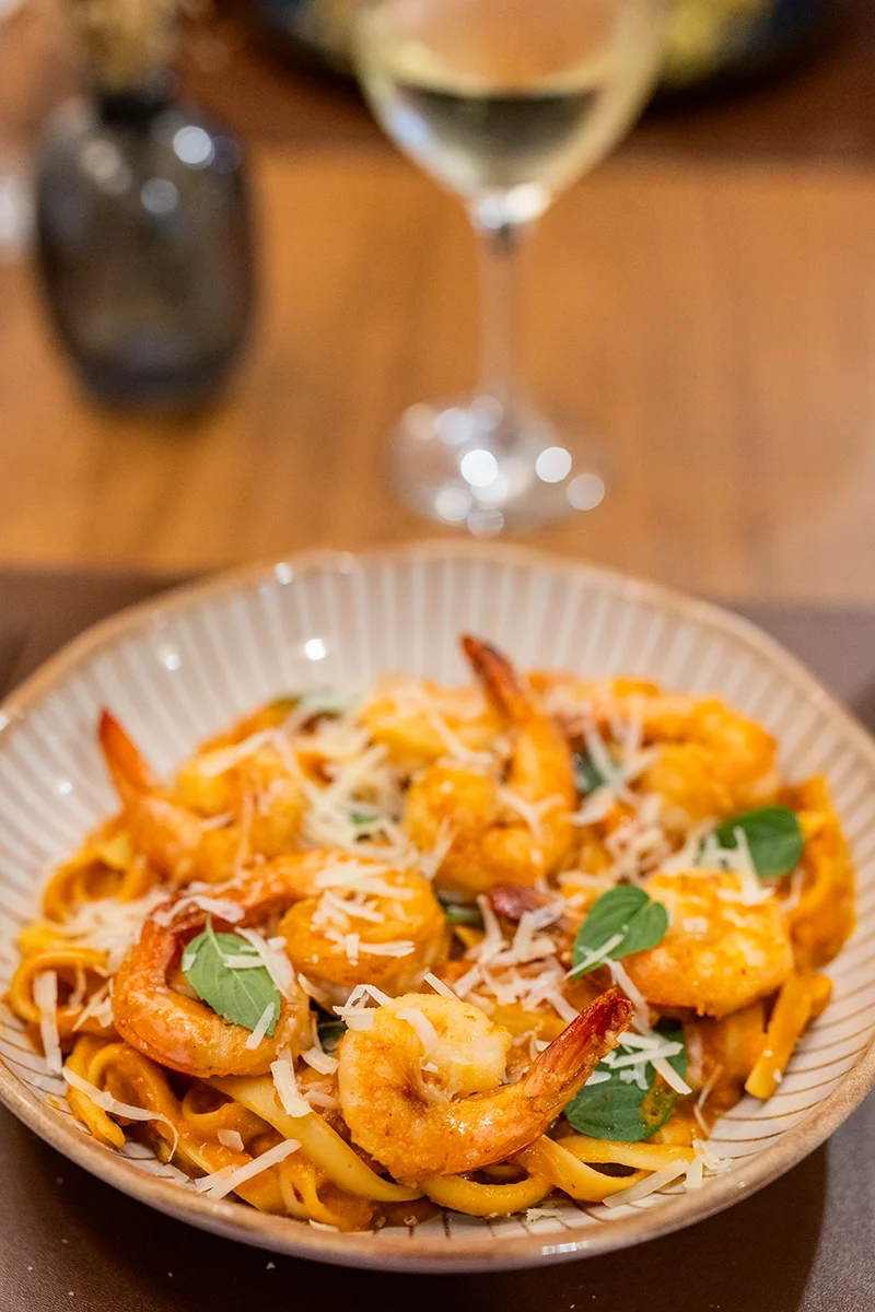 Shrimp pasta with cheese and herbs