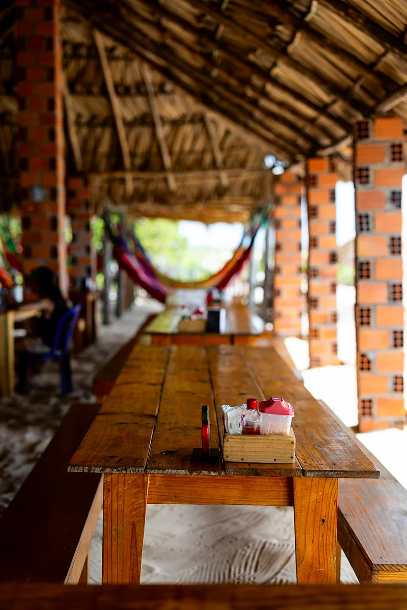Rustic dining area with hammocks