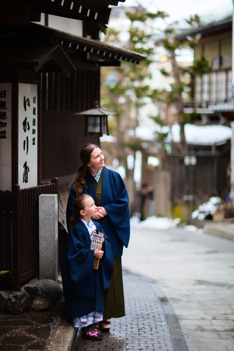 Mother and child in traditional Japanese attire in Shibu Onsen hot spring town