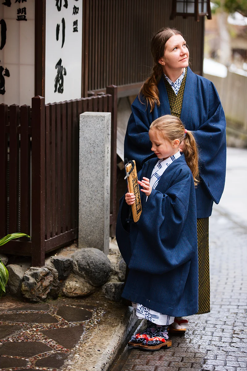 Mother and child wearing traditional Japanese attire in Shibu Onsen