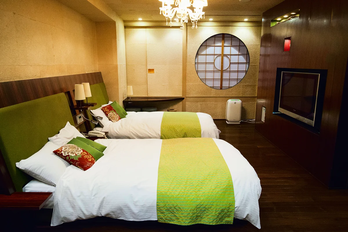 Urban Japanese ryokan room with two beds