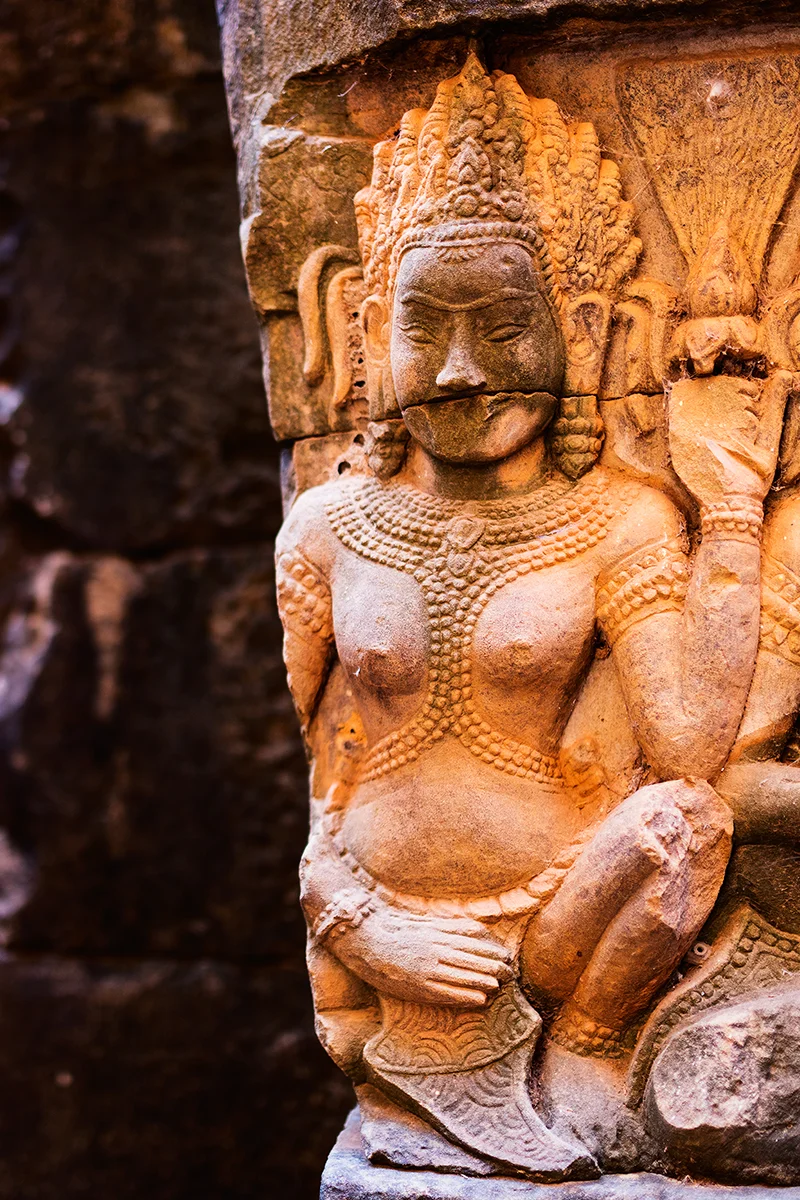 Walls of the Terrace of the Leper King in Angkor covered in remarkably well-preserved bas reliefs
