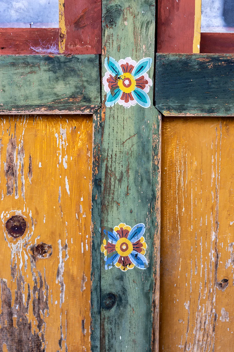 Colorful floral patterns on wooden surface